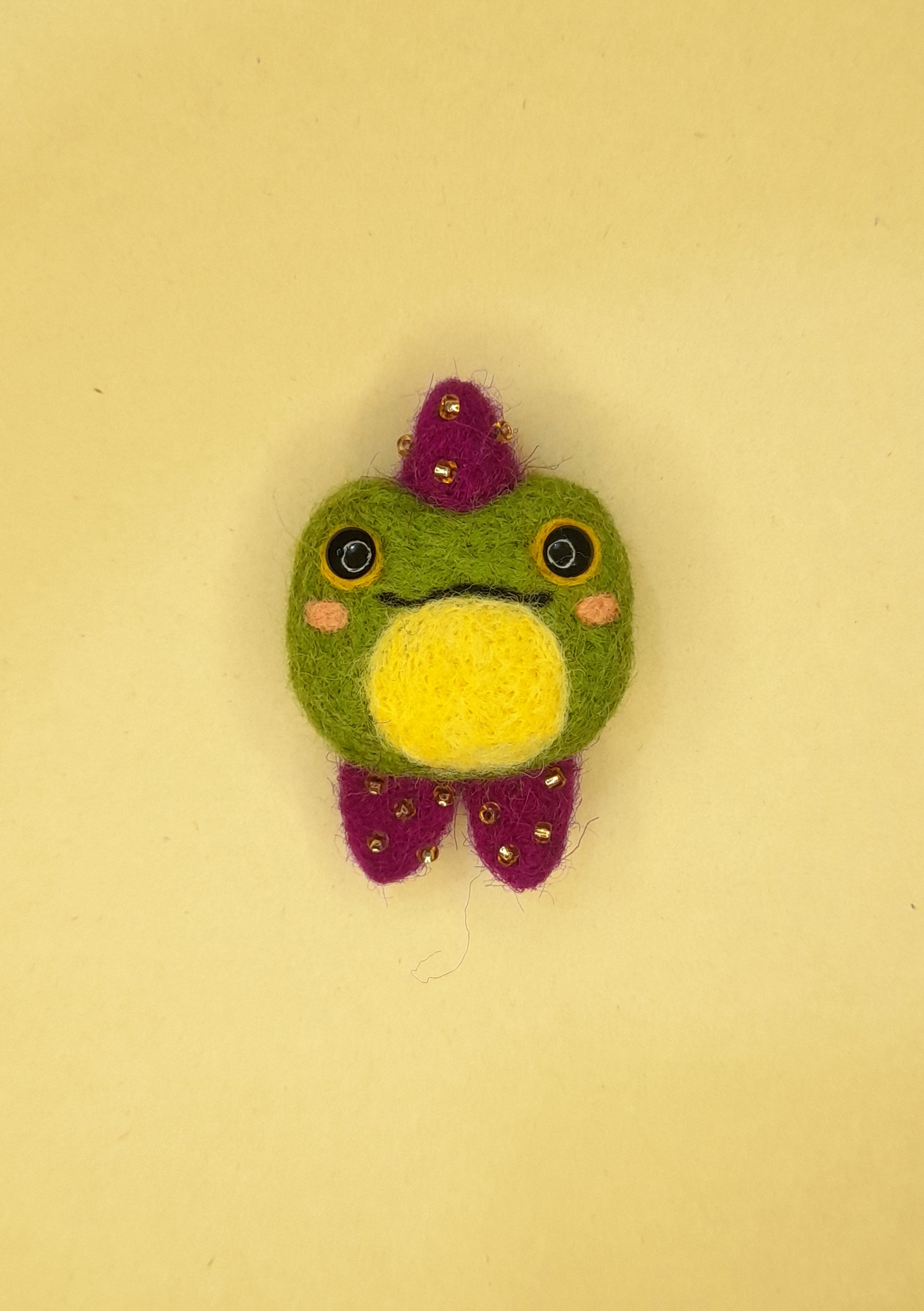 BROCHE RANA MAGA: imagen 1